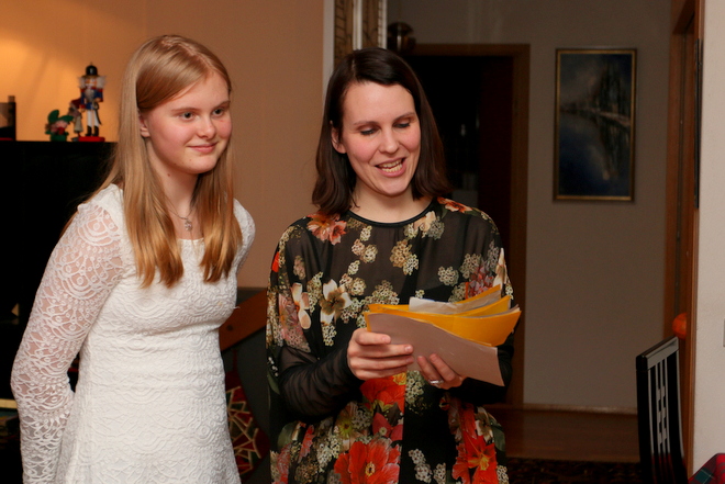 Steinunn and Anna announcing the results of the whist-tournament.