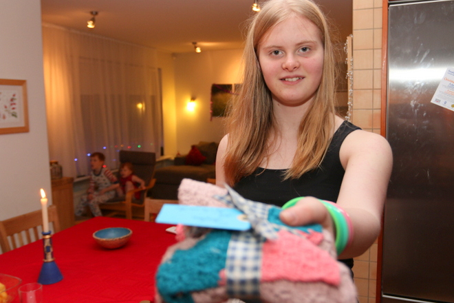 Anna hand-delivering a present.  Contains awesome hand-made cleaning cloths.